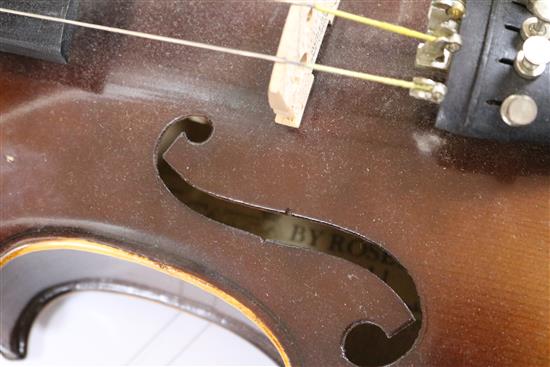 A Rosetti violin bearing faux Stradivarius label, cased with bow